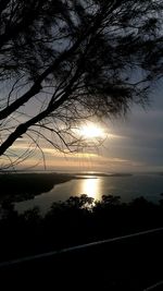 Scenic view of sunset over lake