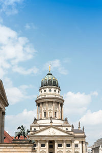 Low angle view of neue kirche against sky