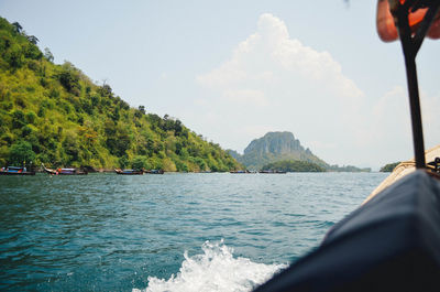Cropped image of boat sailing in sea