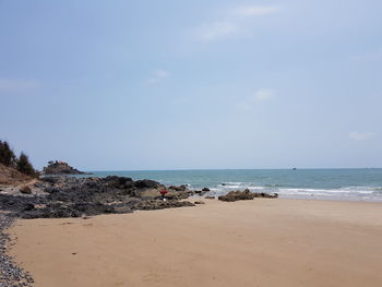 Scenic view of beach against sky