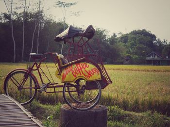 Bicycle parked on field