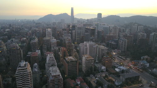 Aerial view of cityscape against sky