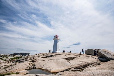 View of lighthouse against cloudy sky