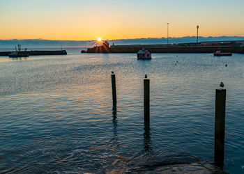 Scenic view of sea against sky during sunset