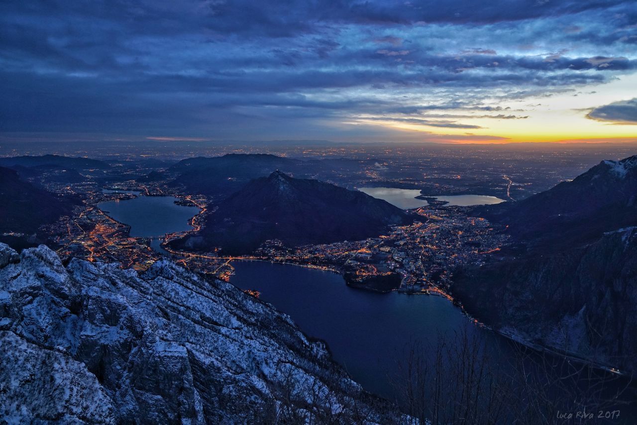 Aerial view of mountain against sky during sunset