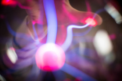 Defocused image of illuminated lights at night