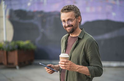 Young man using mobile phone