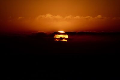 Scenic view of orange sky