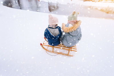 High angle view of toys in snow