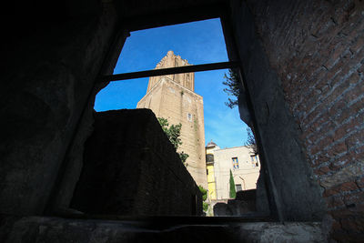 Low angle view of old building against sky