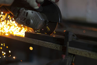 Man working on metal in factory