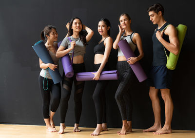 Group of people standing on wall