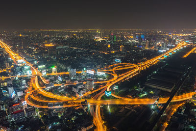 High angle view of illuminated city at night