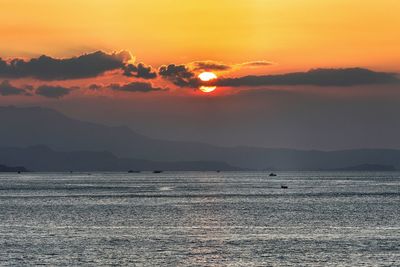 Scenic view of sea against sky during sunset