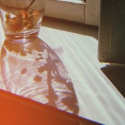 High angle view of glass on table at home