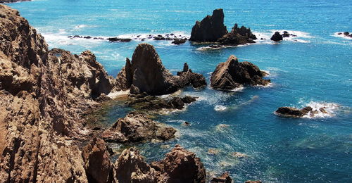 Scenic view of sea against blue sky
