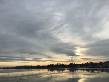 Scenic view of sea against cloudy sky