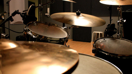 Close-up of drum kit in recording studio