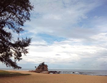 Scenic view of beach against sky