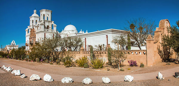 Panoramic shot of building against clear blue sky