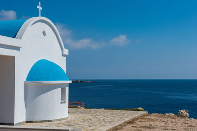 Scenic view of sea against blue sky