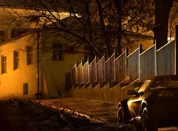 Empty alley with houses in background