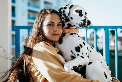 Portrait of woman with dog