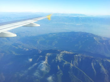 Aerial view of mountains against sky