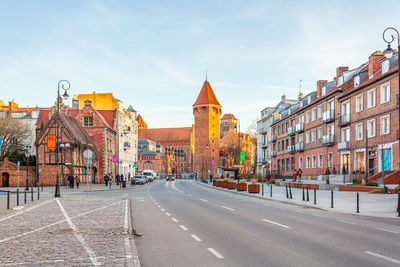 Buildings in city against sky