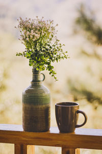 Close-up of wineglass on table against blurred background