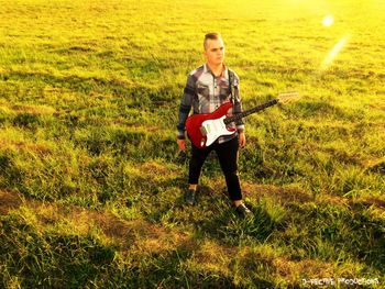 Man standing on grassy field