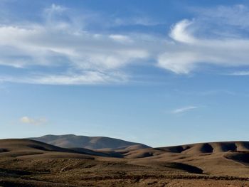 Scenic view of desert against sky