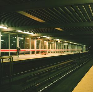 Train at railroad station at night