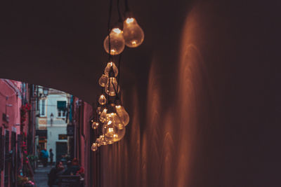 Illuminated lighting equipment hanging in building