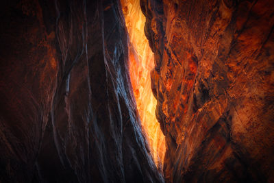 Low angle view of volcanic mountain at night