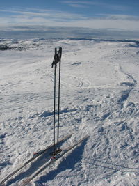 Person standing on snow covered landscape