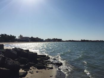 Scenic view of sea against clear blue sky