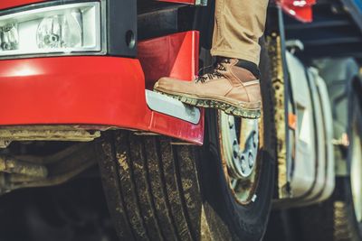 Low section of man on truck