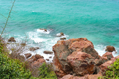 High angle view of rocks on beach