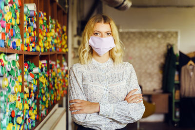 Portrait of woman standing at home