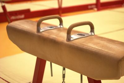 Close-up of empty chair on table