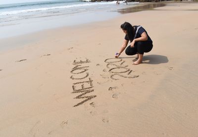 High angle view of woman on beach
