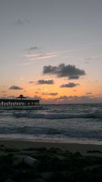Scenic view of sea at sunset