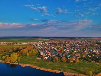 Aerial view of townscape against sky