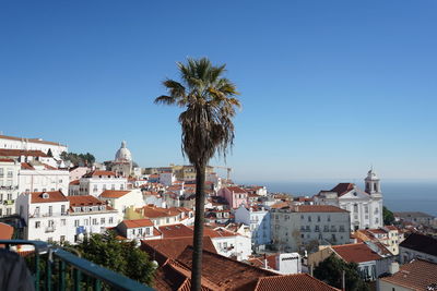 View of cityscape against clear sky