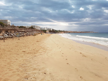 Scenic view of beach against sky