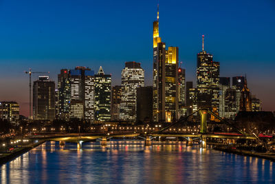 Illuminated city lit up at night