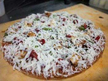 Close-up of pizza served on table