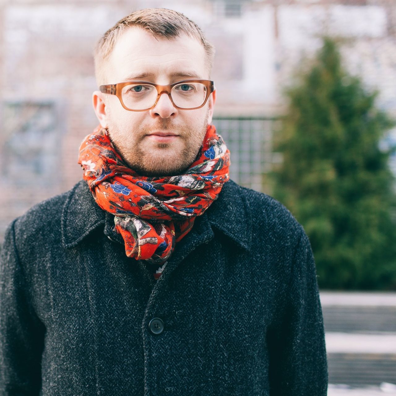 lifestyles, casual clothing, person, looking at camera, focus on foreground, portrait, front view, young men, leisure activity, waist up, warm clothing, smiling, young adult, jacket, mid adult men, headshot, standing, handsome