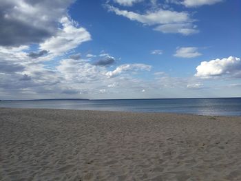 Scenic view of beach against sky